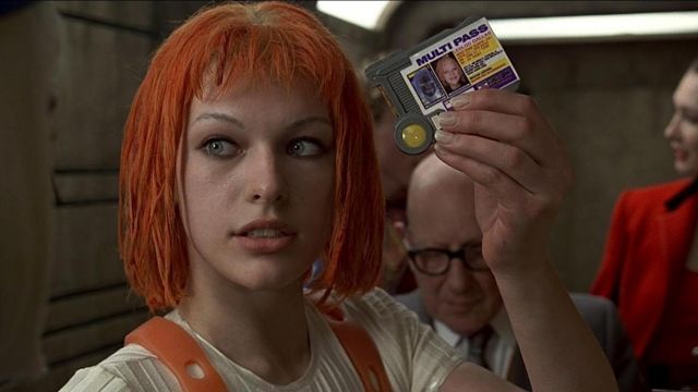 Pictured: Leeloo Dallas from The Fifth Element holding up her multi-pass.